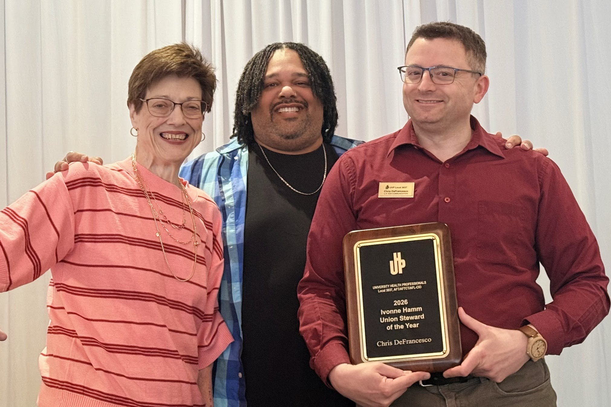 Chris DeFrancesco, VP for communication, accepts the Steward of the Year Award.