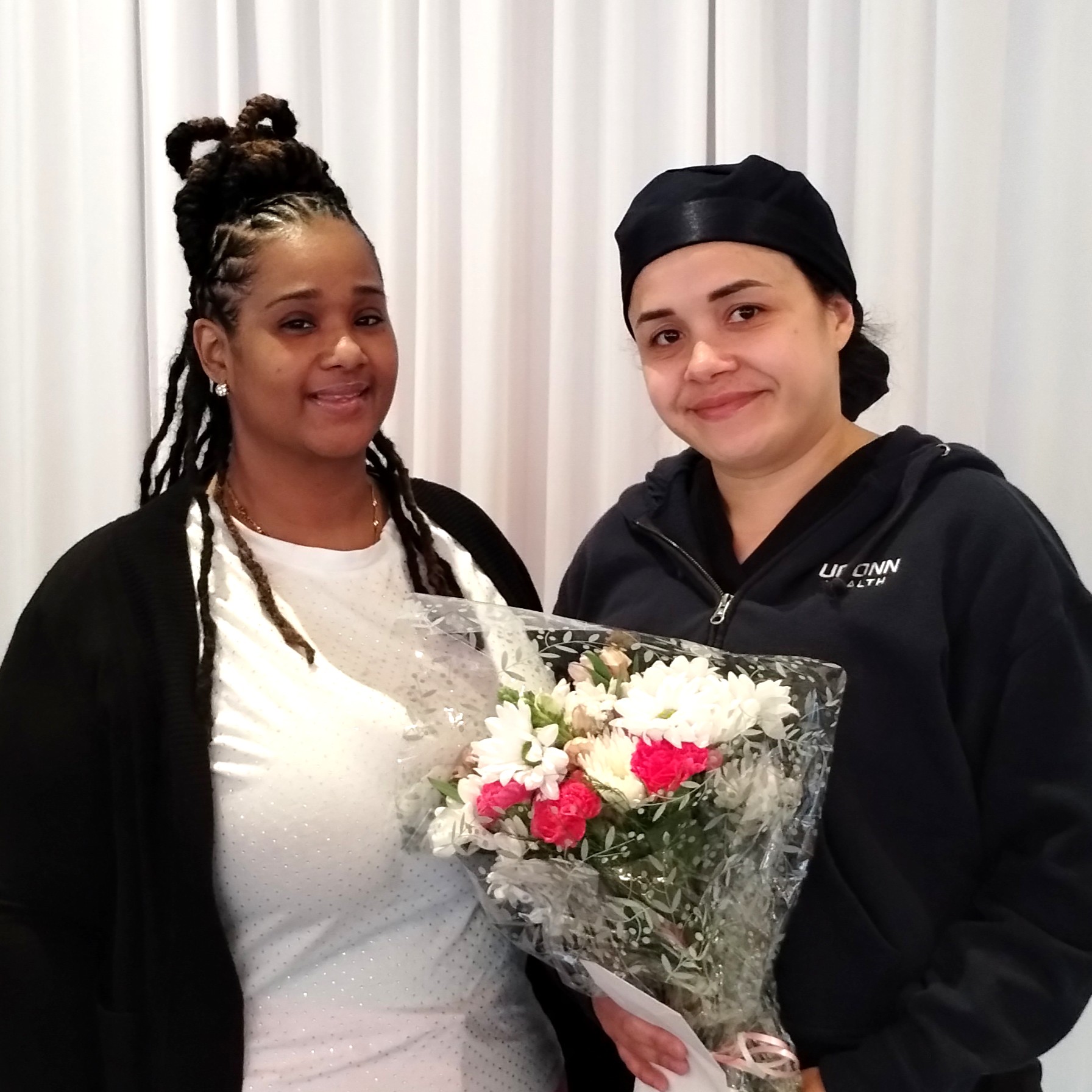 VP Membership Activities Shaneé Reid presents the Thomas Alsgaard Memorial Scholarship to Janelle Brandon.