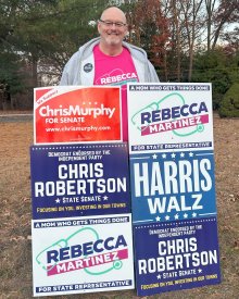 Bill with six election signs