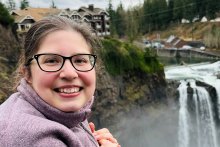 Meg in front of waterfall