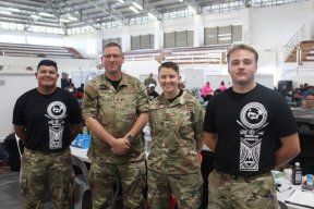 Mike Wilhelm in portrait of 4 on deployment